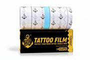 Packaging of Sorry Mom Tattoo Film with a nautical theme, including anchors, in a roll format with the brand 'Sorry Mom' visible.